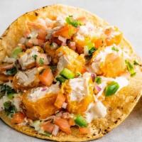 Crispy Baja Fish Taco · Crispy plant-based battered fish, creamy jalapeno slaw, cilantro, pico de gallo and a lime w...