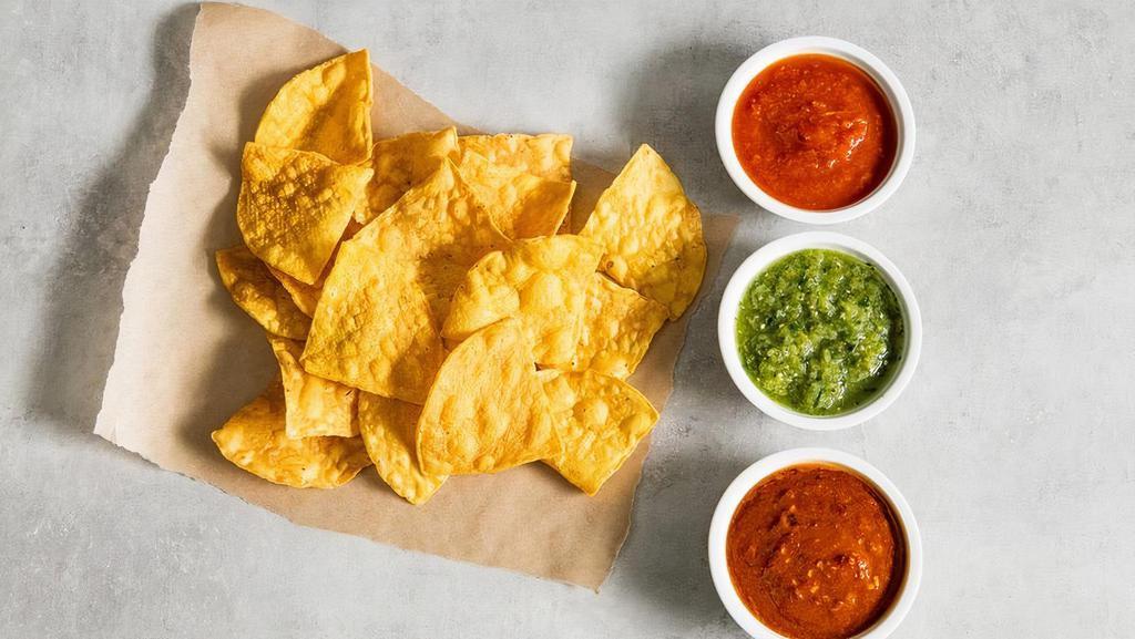 Chips + Salsa · Crispy tortilla chips with a salsa trio. Gluten-friendly. . Roja (mild) a blend of tomatoes, cilantro, onion + lime . Tomatillo (medium) a blend of garlic, jalapeño, cilantro, tomatillo chilis, onion + lime . Diablo (hot!!) a spicy mix of peppers, habanero chilis + garlic .