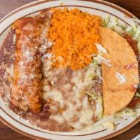 #1 Taco and Enchilada Combo · Served with rice and beans.