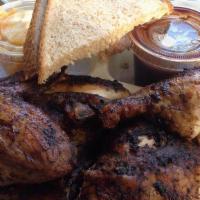 Jamaican Jerk Chicken Lunch · Quarter chicken. Spicy jerk seasoning.