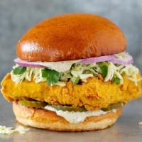 Crispy Tofu Sandwich · Organic tofu from Hodo®, fried crisp and served with green cabbage & cilantro slaw, sliced r...