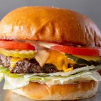 Cheeseburger · American cheese, lettuce, tomatoes, pickles & secret sauce on a toasted egg bun.