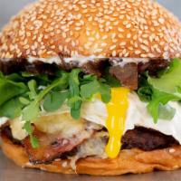 California Burger · Fried egg, Cowgirl Creamery’s Wagon Wheel cheese, Zoe’s bacon, arugula, balsamic onions & ma...