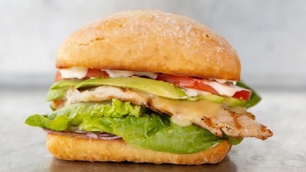 California Chicken · Chicken, grilled & served with sliced avocado, jack cheese, romaine lettuce, tomatoes, red onion & lemon mayo on a toasted country roll.