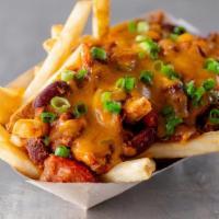 Chili Cheese Fries · Topped with house-made chili, cheddar cheese & green onions.