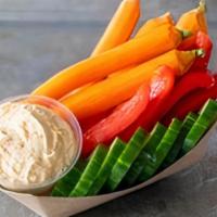 Fresh Veggies & Hummus · Fresh, raw carrots, cucumber & bell pepper served with organic hummus.