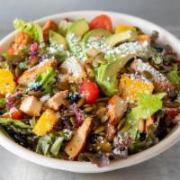 Citrus & Avocado Chop Salad · Romaine & red leaf lettuce tossed with Asado spice-rubbed chicken, cilantro-pumpkin seed dre...