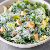 Kale Salad · Kale & romaine lettuce tossed with parmesan cheese, focaccia croutons & lemon-Dijon vinaigre...