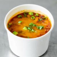 Chili · House-made beef & bean chili made with Anchor Steam. Topped with cheddar cheese & green onio...