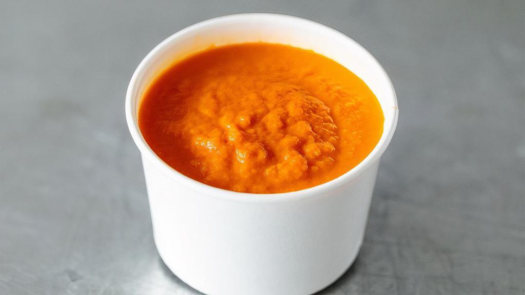 Spicy Tomato Soup · House-made with chipotle peppers.