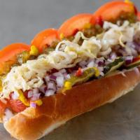 Works Dog · With ketchup, mustard, mayo, diced red onions, sweet relish, dill pickles, sauerkraut & toma...