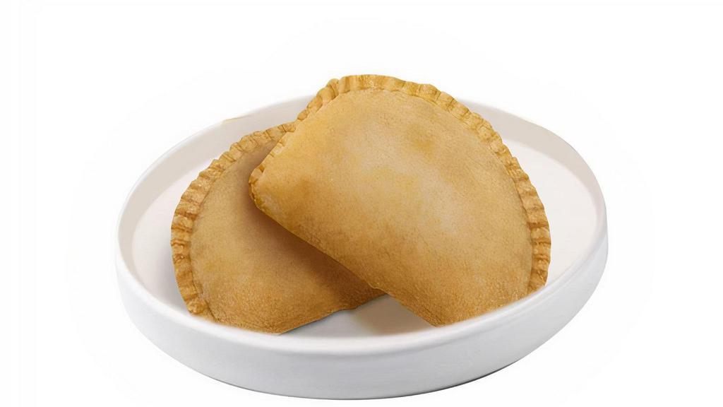 Chicken Empanada - Individual · Savory dough generously filled with delectable chicken. Best seller!