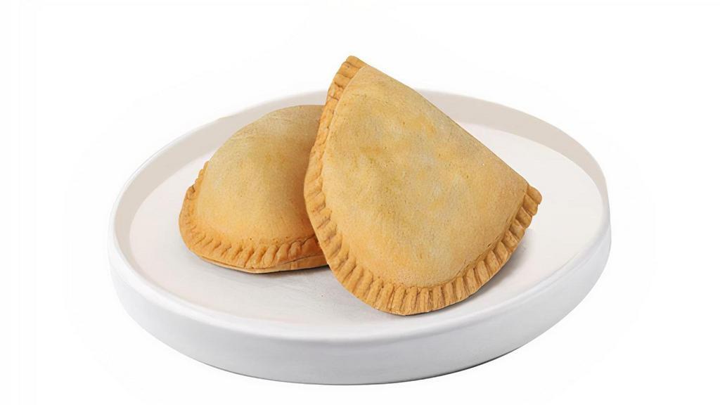 Pork Empanada - Individual · Savory dough generously filled with delectable pork