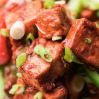 Chili Paneer · Paneer deep fried with batter and sautéed bell peppers, manchurian sauce, ketchup, green oni...