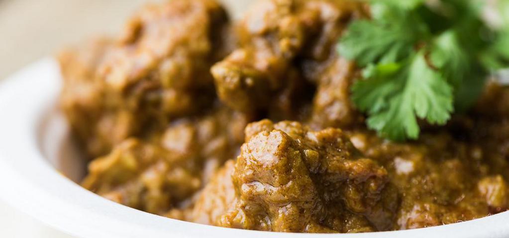 Chicken Curry (Boneless) · Chicken pieces slow-cooked in South Indian spices in rich onion sauce.