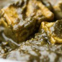 Saag Paneer · Paneer cooked in clay oven and simmered in spinach puree.