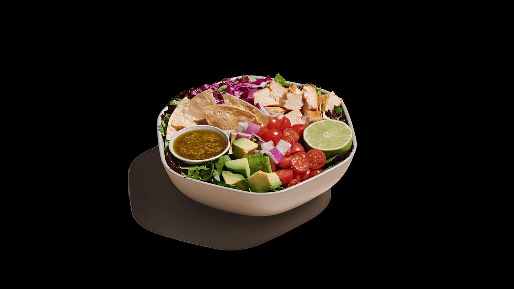 Guacamole Greens · roasted chicken, avocado, tomato, shredded cababge, red onion, tortilla chips, chopped romaine, spring mix, fresh lime squeeze, lime cilantro jalapeno vinaigrette
