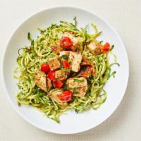 Keto Chicken Pesto Zoodle · Pan roasted zucchini noodles served with homemade pesto sauce, grape tomatoes and seasoned c...