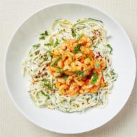 Keto Shrimp Alfredo Zoodle · Pan roasted zucchini noodles served with homemade Alfredo sauce and spicy garlic shrimp. Glu...