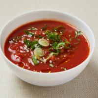 Salsa · Homemade tomato based spicy sauce with onion, jalapeno, serrano, cilantro and lime. Gluten-f...