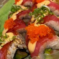 Cherry Blossom · Salmon, avocado roll topped with red tuna, masago, scallion, spicy mayo, unagi sauce.