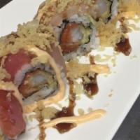 Spicy Crunchy Rainbow · Shrimp tempura, spicy tuna roll topped with assorted fish, tempura flake, spicy mayo, unagi ...