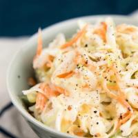 Slaw · Finely Shredded Fresh Cabbage and Carrots with Creamy  Mayonnaise, Apple Vinaigrette and Bro...