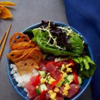 Geisha's Kiss Bowl · Yellowfin Tuna (Raw), Tamago, Piquillo Peppers, Lotus Chips, Pickled Cucumbers, Green Leaf L...