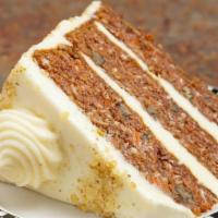 Carrot Cake · A triple-layer spice cake with carrots, coconut, pineapple and walnuts layered with cream ch...