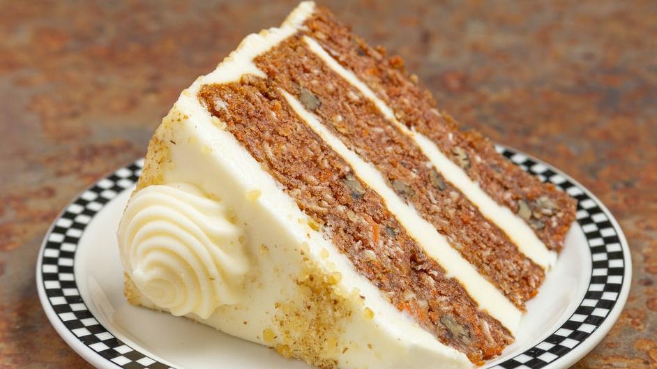Carrot Cake · A triple-layer spice cake with carrots, coconut, pineapple and walnuts layered with cream cheese frosting..