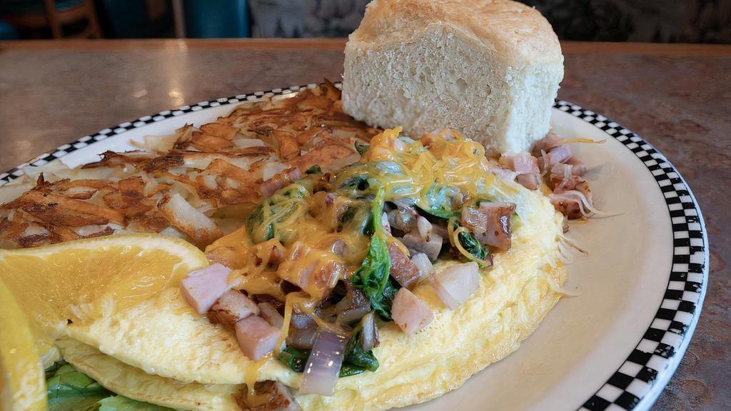 Joe's Hobo Omelette · Ham, link sausage, bacon, jack cheese, cheddar cheese, spinach & onion.
