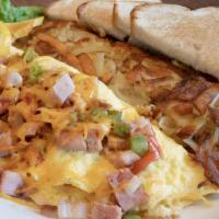Denver Omelette · Diced ham, bell pepper & onion, topped with cheddar cheese.