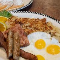 The Grizz · 2 sweet cream pancakes, 3 eggs*, 2 slices of bacon, 2 sausage links & a ham steak, served wi...