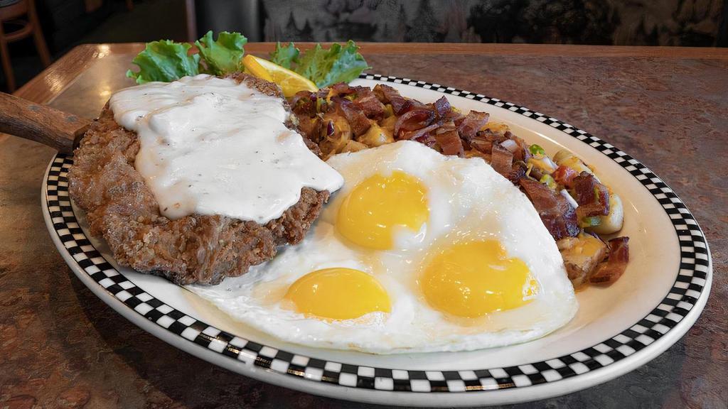 Bigfoot Chicken Fried Steak & Eggs* · Served with 3 eggs, strip-cut hash browns, country red potatoes OR fresh fruit & 2 housemade biscuits.