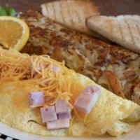 Ham & Cheese Omelette · Made with 2 eggs*, diced ham and cheddar cheese.