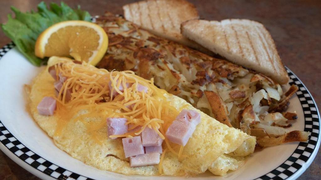 Ham & Cheese Omelette · Made with 2 eggs*, diced ham and cheddar cheese.