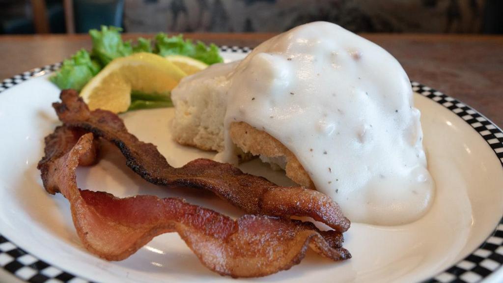 1 Biscuit & Country Gravy · Served with 2 Slices of Bacon OR 2 sausage links.
