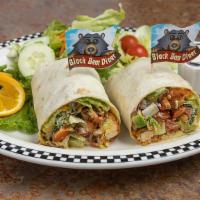 Crispy Chicken Bacon Ranch Wrap · Diced crispy chicken strips tossed with salad mix, red onion, diced tomato, avocado and our ...