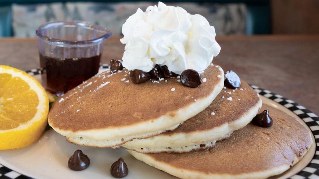 Cubs’ Chocolate Chip Pancakes · 3 of our yummy pancakes loaded with chocolate chips. Sprinkled with powdered sugar and topped with a dab of whipped cream.