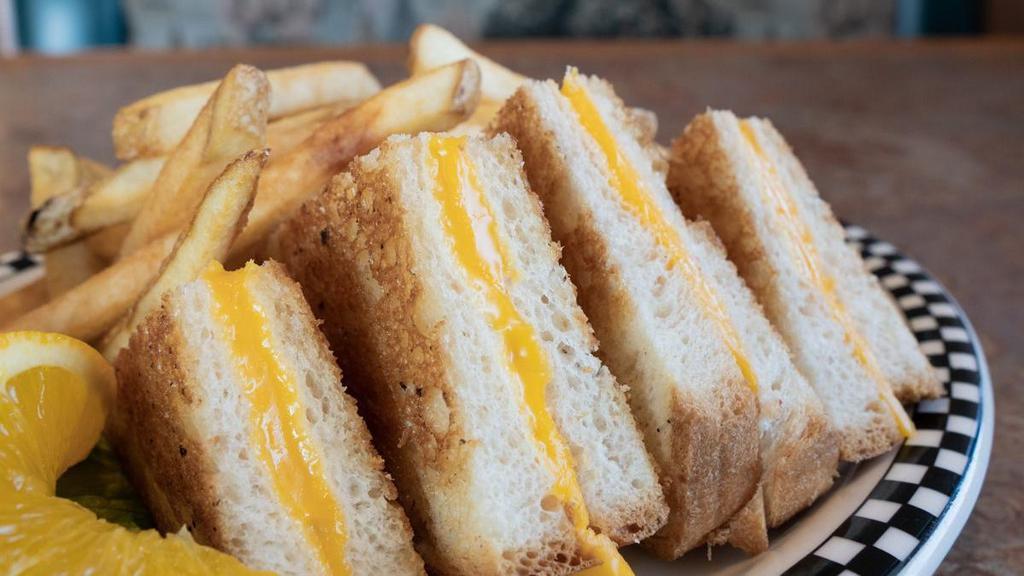 Cubs' Grilled Cheese Sandwich · A classic served with American Cheese.  Served with your choice of French fries or fresh fruit.