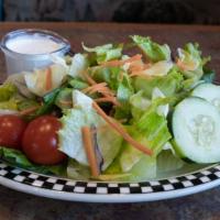 Dinner Salad · Salad mix topped with cherry tomato, cucumber and carrot.  Served with your choice of dressi...