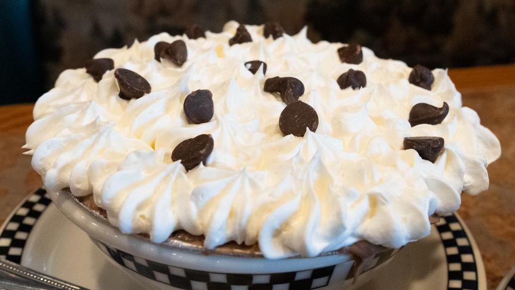 Chocolate Cream Pie · Rich chocolate cream in a chocolate cookie crust.  Topped with whipped cream.