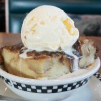 Olga'S Bread Pudding · Made with bread, heavy whipping cream, eggs and vanilla, then served warm with a scrumptious...