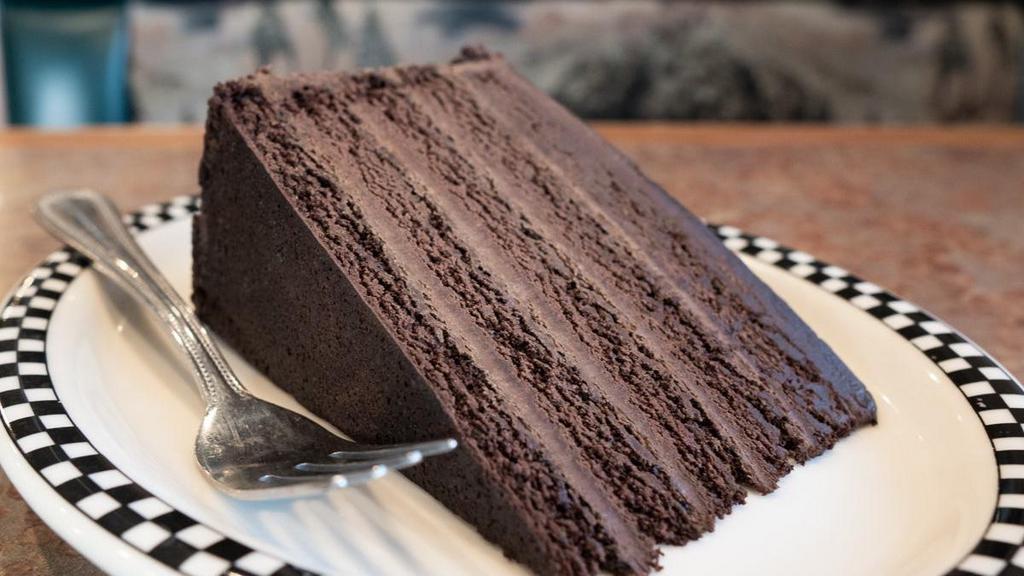 5 Layer Chocolate Cake · Five layers of moist chocolate cake finished with an elegant dark chocolate ganache.