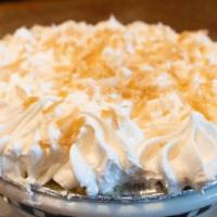 Coconut Cream Pie · Decadent coconut cream in a buttery graham cracker crust.  Topped with whipped cream and toa...