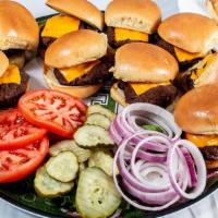 Cheeseburger Sliders & Fries · Nine cheeseburger sliders served with a mountain of fries, lettuce, tomato, onion, pickles a...