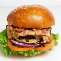 Uncle Burger · Glazed with honey BBQ sauce, topped with bacon, cheese, crispy-fried eggplant, lettuce, toma...