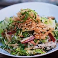 Asian Chicken Salad · Asian slaw, romaine lettuce, cilantro, grilled chicken, miso dressing, fried wontons, sesame...