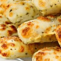 Cheesy Breadsticks · Fresh breadsticks loaded with cheese.