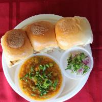 Pav Bhaji · Tomato and Potato buttery semi-gravy dish served with a 3pieces of butter pav